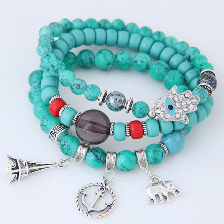 Ensemble de bracelets Hamsa contre le mauvais œil avec la tour de l'éléphant Olivenorma