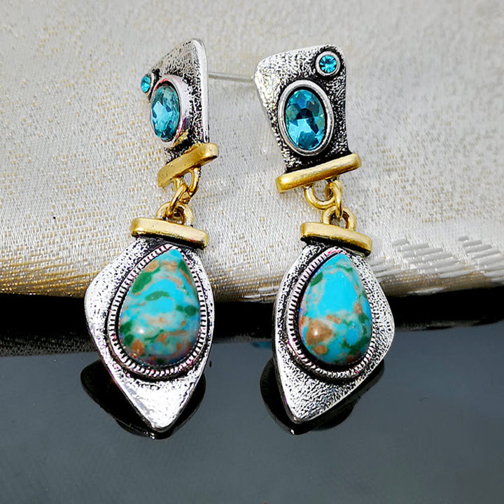 Boucles d'oreilles en argent avec topaze bleue et pierre empereur Olivenorma 