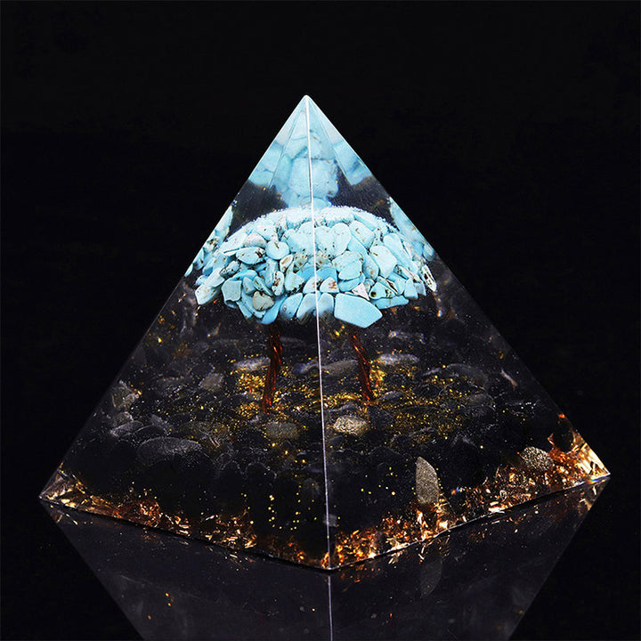 Pyramide porte-bonheur en obsidienne Olivenorma avec orgone turquoise