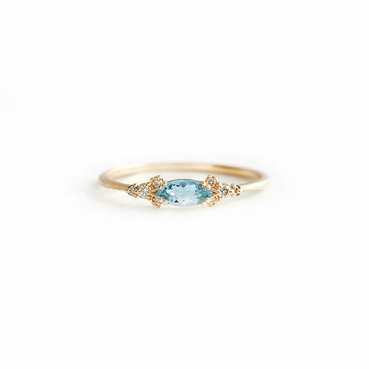 Ensemble de 4 bagues de fiançailles élégantes en topaze bleue avec feuille Olivenorma