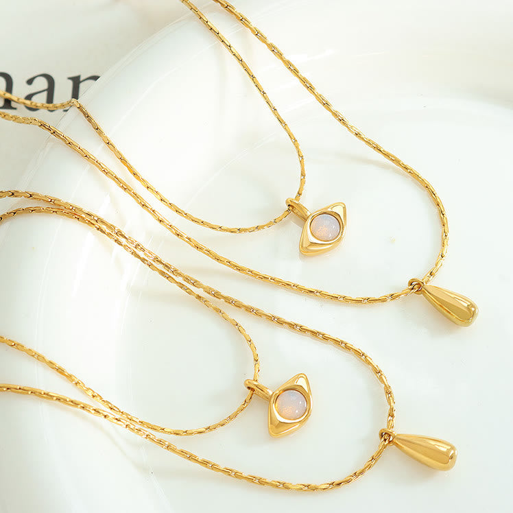 Collier double couche avec pendentif en opalite contre le mauvais œilnorma Olivenorma 