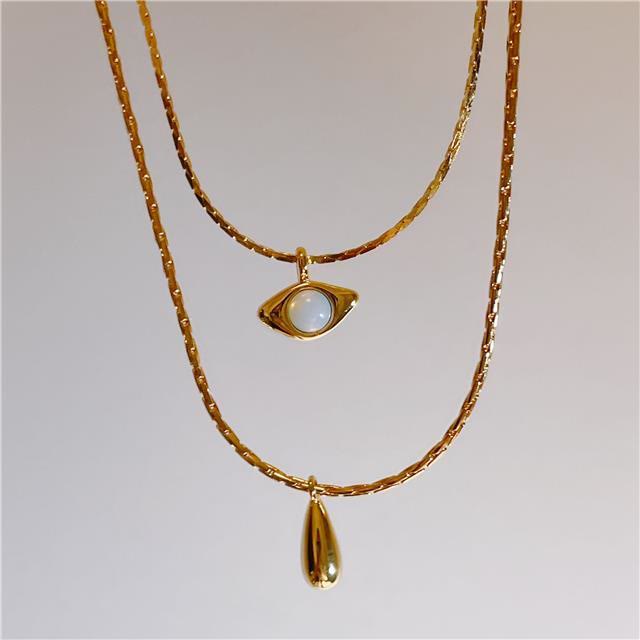 Collier double couche avec pendentif en opalite contre le mauvais œilnorma Olivenorma 