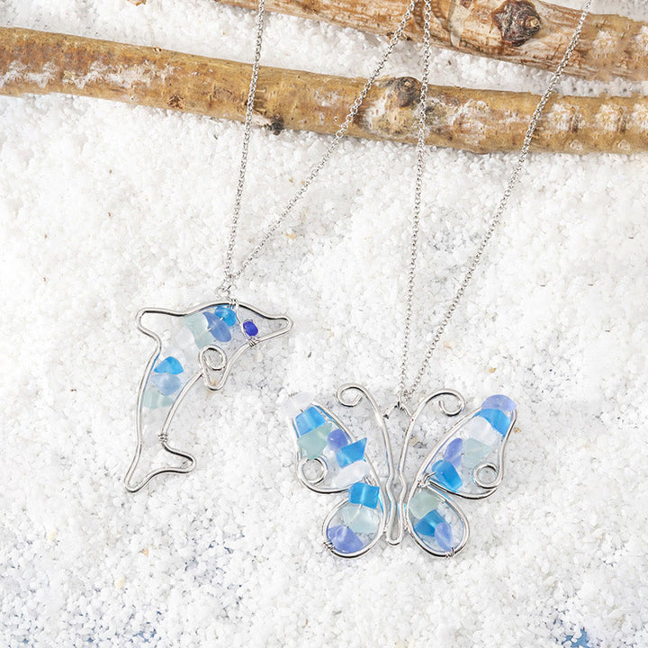 Collier en verre de mer avec papillon et dauphin Olivenorma 