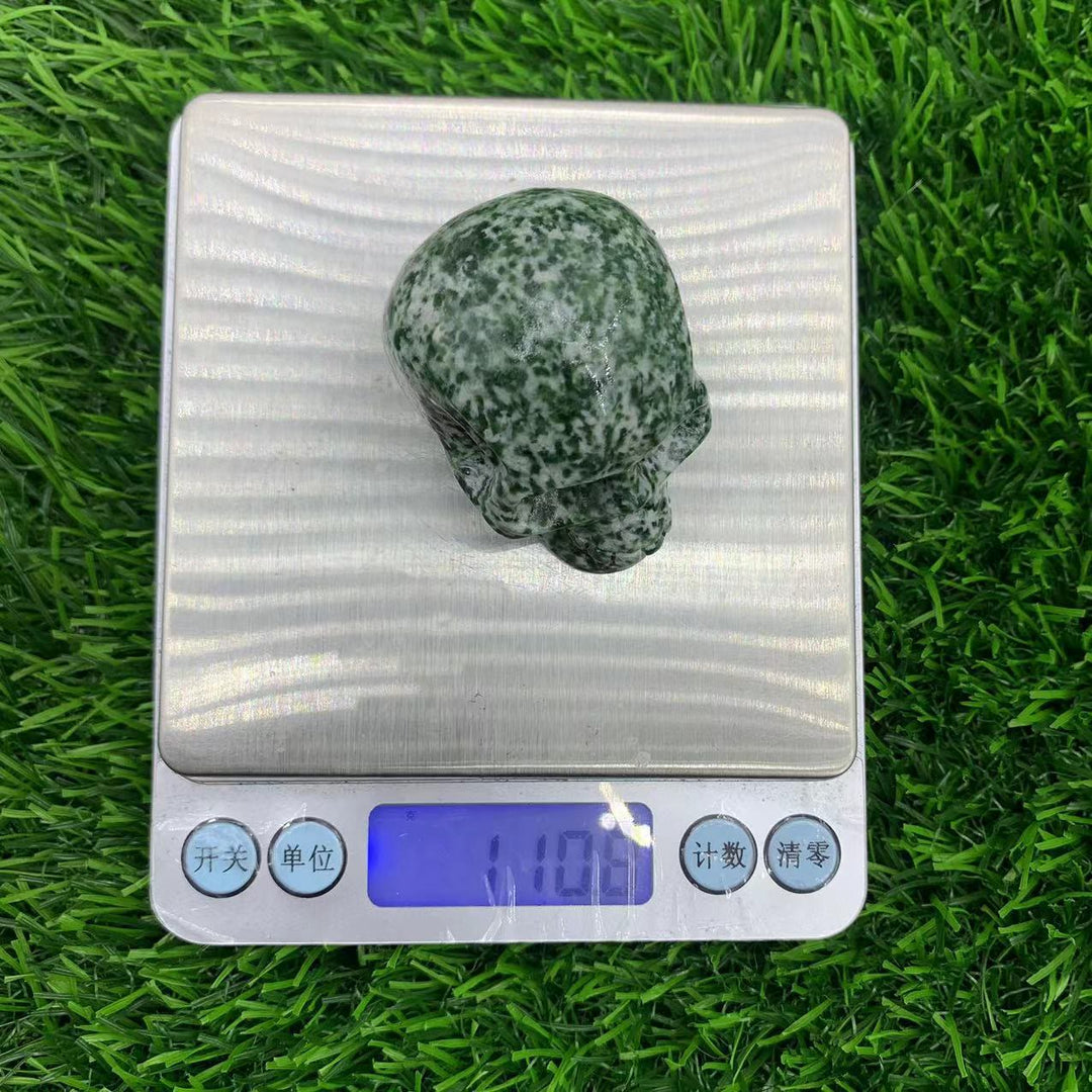 Décoration en pierre précieuse de crâne en cristal naturel sculpté Olivenorma de 5 cm 