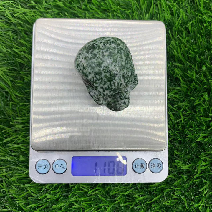 Décoration en pierre précieuse de crâne en cristal naturel sculpté Olivenorma de 5 cm 
