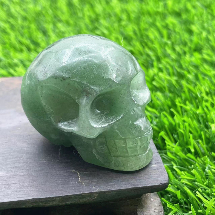 Décoration en pierre précieuse de crâne en cristal naturel sculpté Olivenorma de 5 cm 