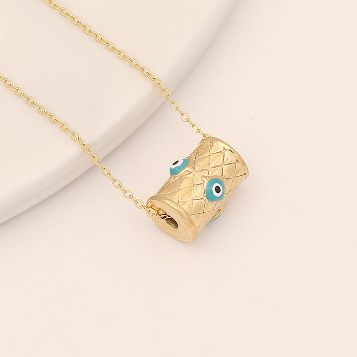 Collier pendentif croix mauvais œil turquoise Olivenorma 
