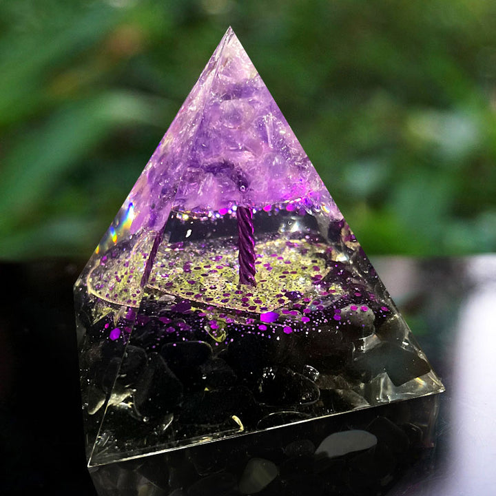 Sphère d'améthyste Olivenorma avec pyramide d'orgone en obsidienne 