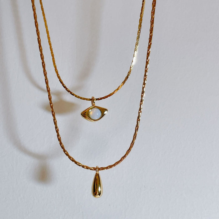 Collier double couche avec pendentif en opalite contre le mauvais œilnorma Olivenorma 