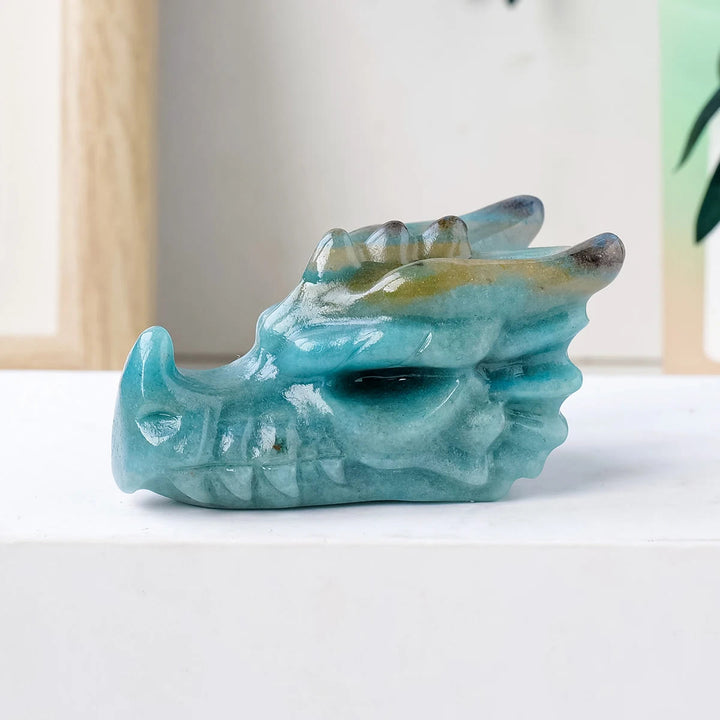 Décoration en pierre précieuse sculptée en forme de tête de dragon en apatite bleue Olivenorma
