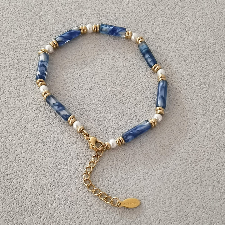 Ensemble de quatre bracelets en perles de cristal naturel Olivenorma