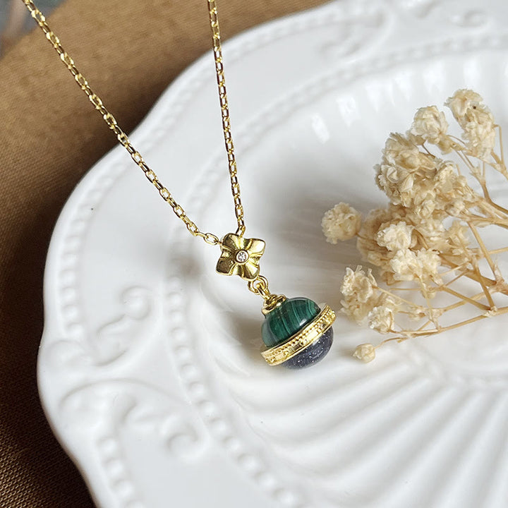 Collier pendentif en forme de sphère en grès bleu malachite « Stellar Corona » Olivenorma