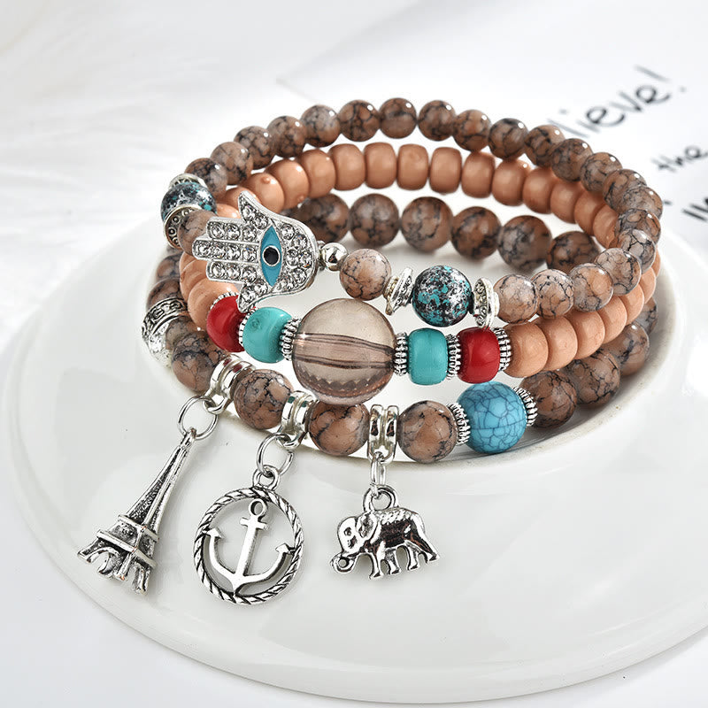 Ensemble de bracelets Hamsa contre le mauvais œil avec la tour de l'éléphant Olivenorma