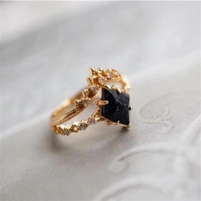 Bague couronne à double rangée de zircons blancs et de grès bleu Olivenorma