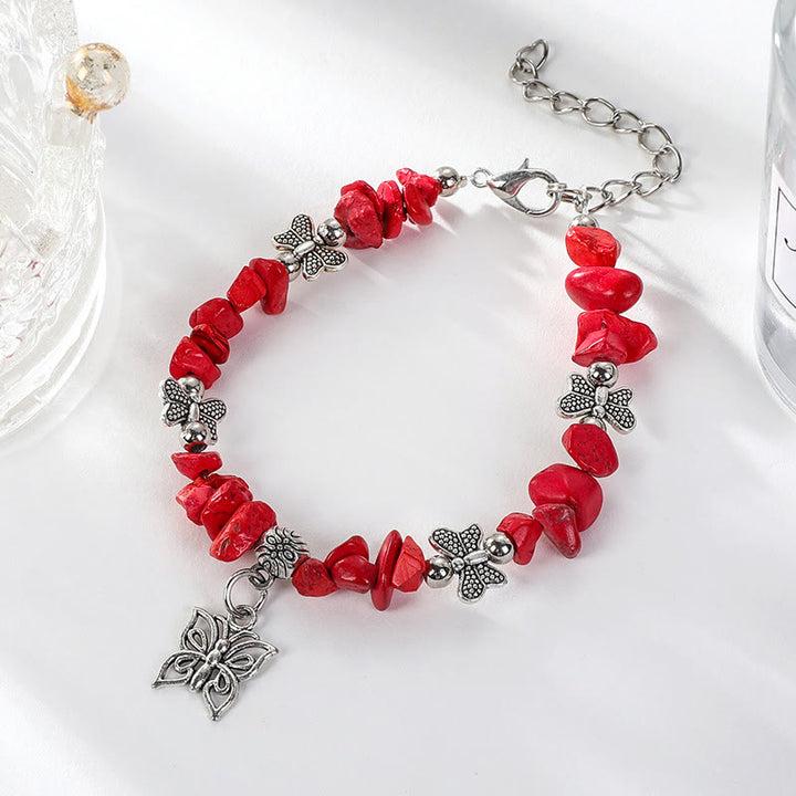 Bracelet à breloques papillon en cristal coloré Olivenorma