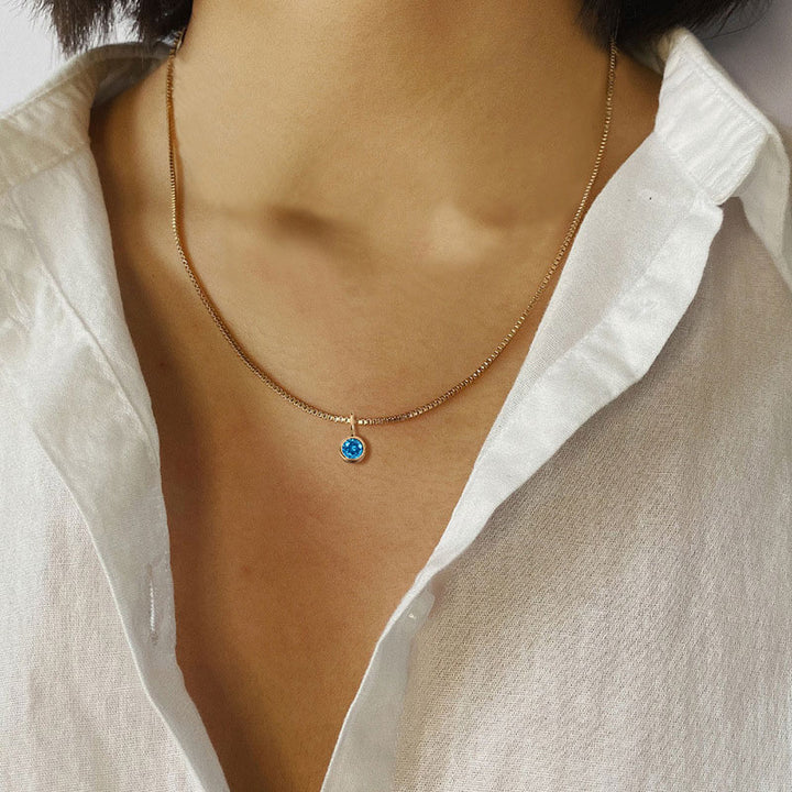 Collier Olivenorma en acier titane et zircon avec pierre de naissance de 8 mm 