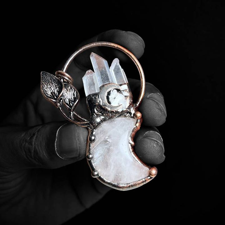 Collier avec pendentif en cristal transparent en forme de lune et de plante en pierres précieuses Olivenorma