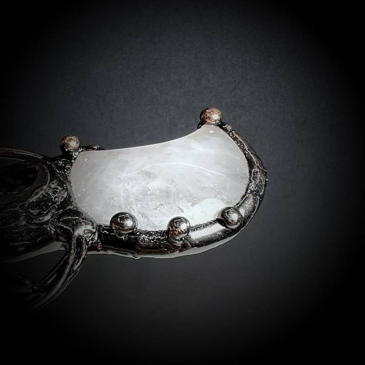 Collier avec pendentif en cristal transparent en forme de lune et de plante en pierres précieuses Olivenorma