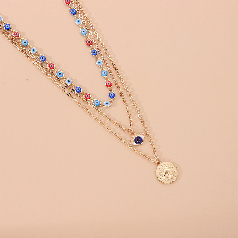 Collier à trois canapés en œil de diable coloré Olivenorma 