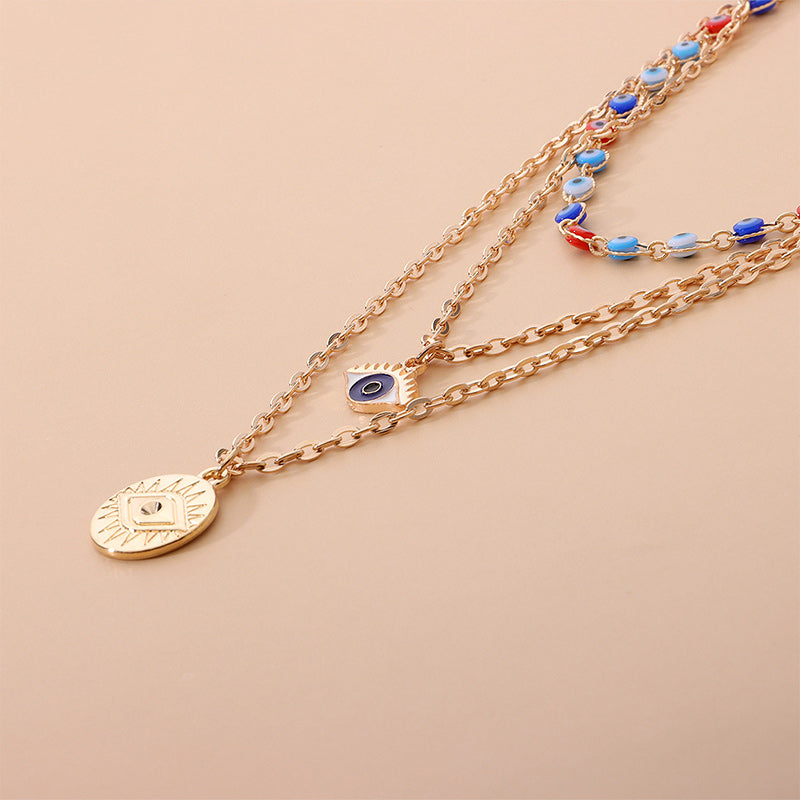 Collier à trois canapés en œil de diable coloré Olivenorma 