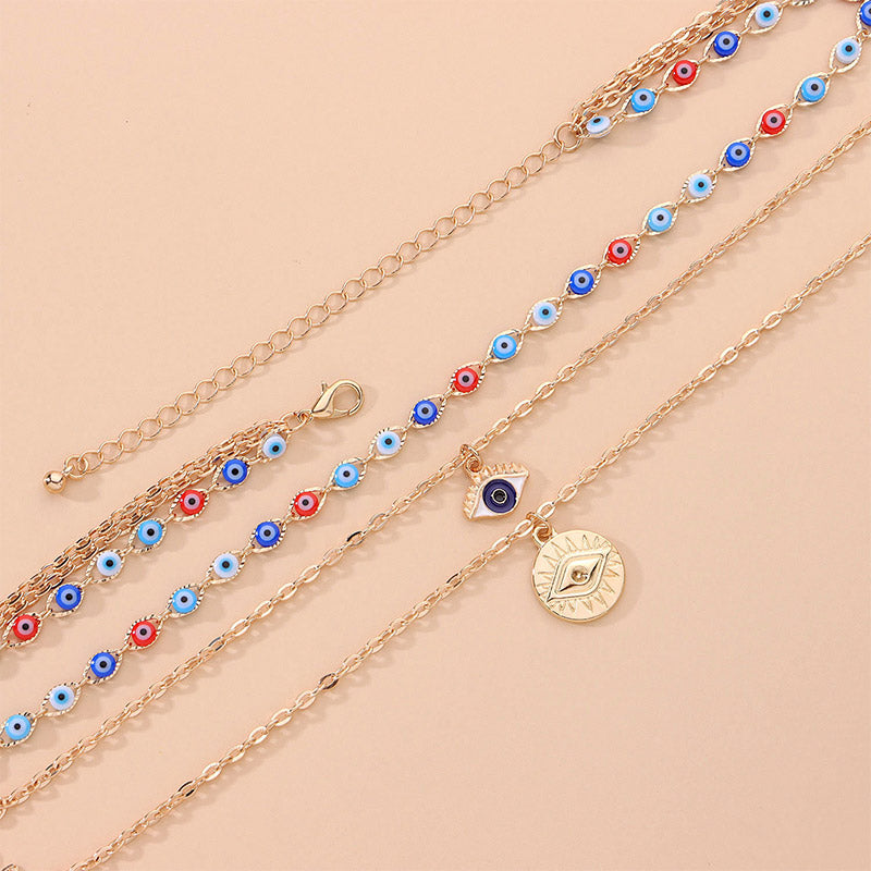 Collier à trois canapés en œil de diable coloré Olivenorma 