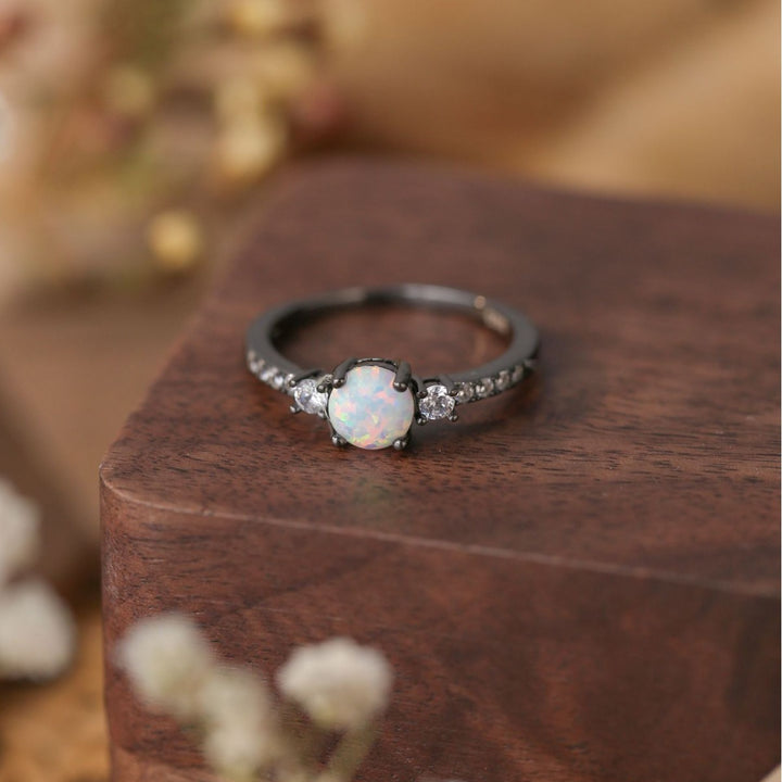Bague Olivenorma en argent S925 plaqué or noir avec zircon blanc opale