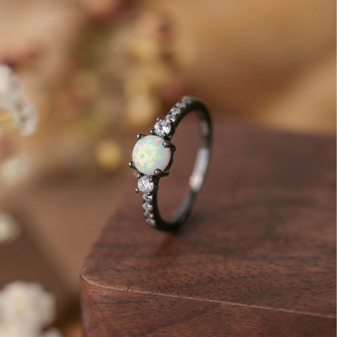 Bague Olivenorma en argent S925 plaqué or noir avec zircon blanc opale