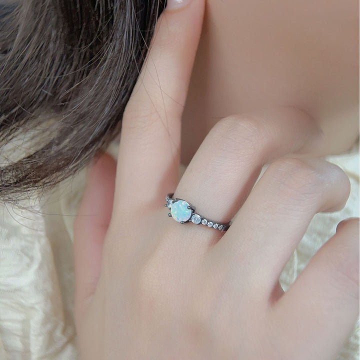 Bague Olivenorma en argent S925 plaqué or noir avec zircon blanc opale