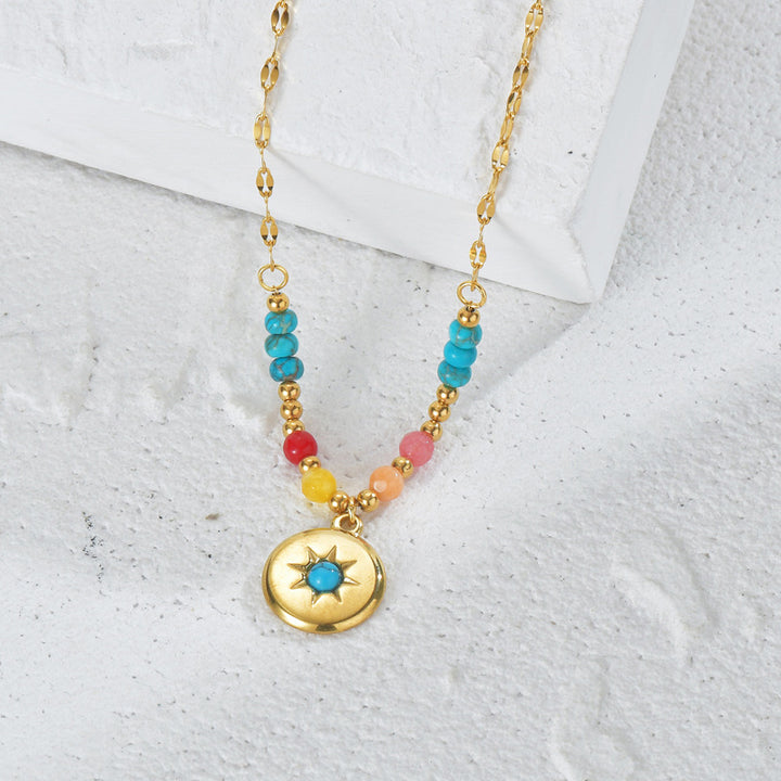Collier pendentif turquoise Olivenorma en acier titane 14 carats 