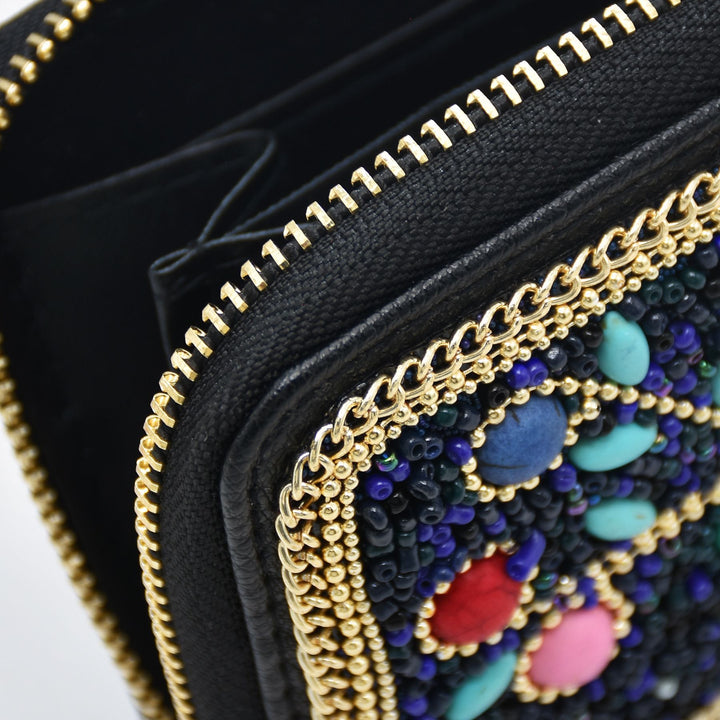 Pochette Olivenorma en perles de riz turquoise à motif arbre de vie