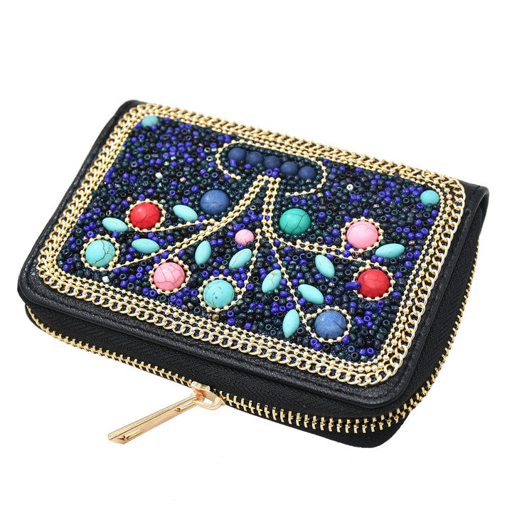 Pochette Olivenorma en perles de riz turquoise à motif arbre de vie