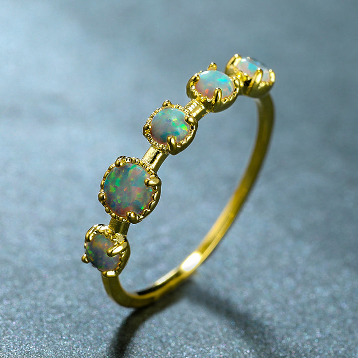 Bague Olivenorma à cinq motifs simples en opale bleue et blanche