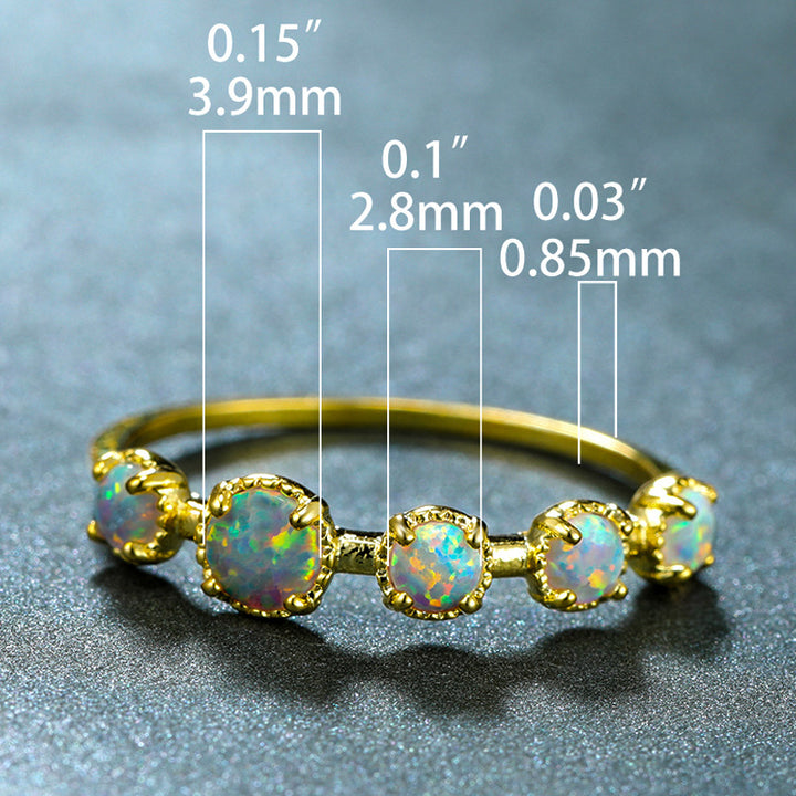 Bague Olivenorma à cinq motifs simples en opale bleue et blanche