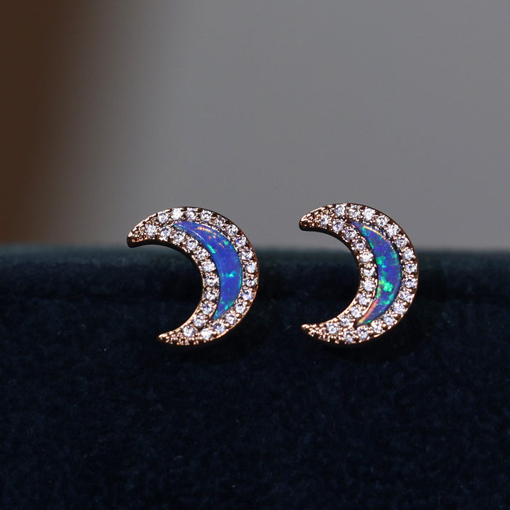 Boucles d'oreilles en forme de lune avec zircon bleu opale Olivenorma
