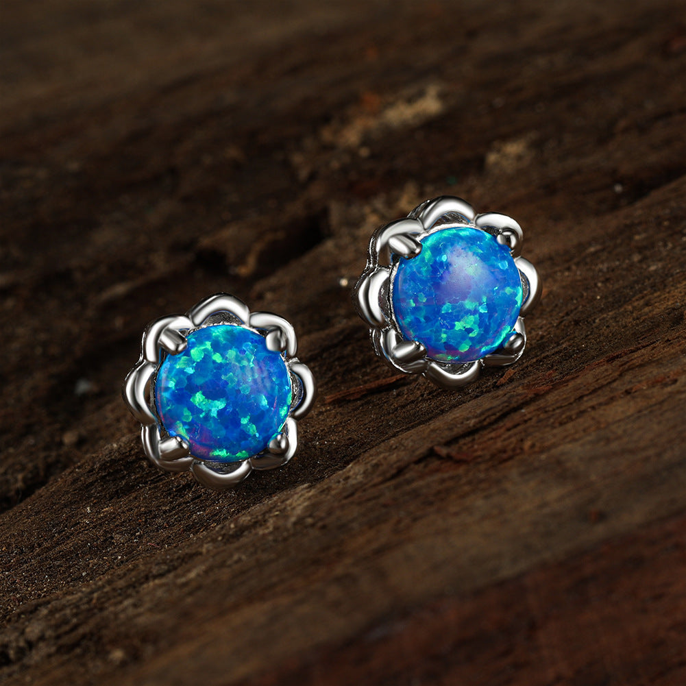 Boucles d'oreilles de luxe Olivenorma à quatre griffes en opale - Opale bleue - image 0