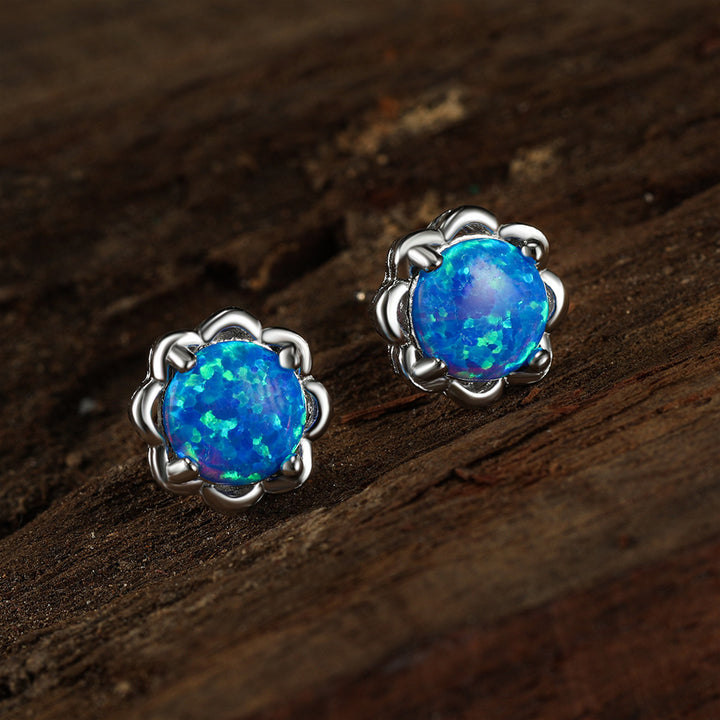 Boucles d'oreilles de luxe Olivenorma à quatre griffes en opale - Opale bleue - image 0