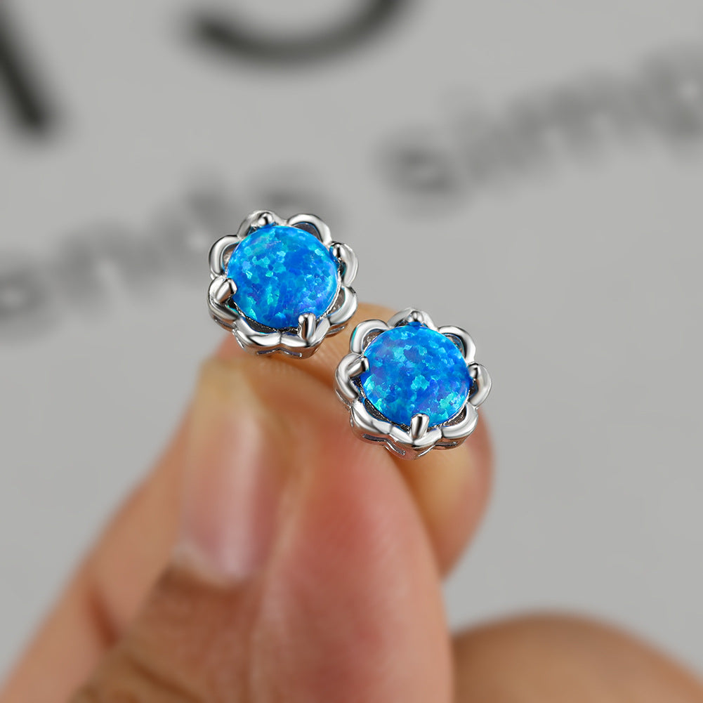 Boucles d'oreilles de luxe Olivenorma à quatre griffes en opale - image 1