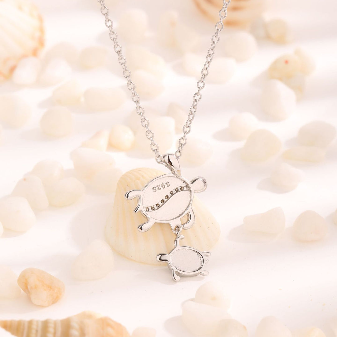 Collier avec pendentif double tortue en opale bleue Olivenorma