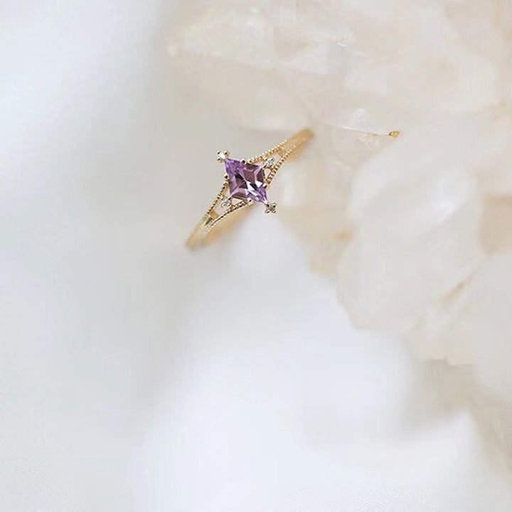 Bague de guérison en forme d'étoile avec topaze bleue et améthyste Olivenorma
