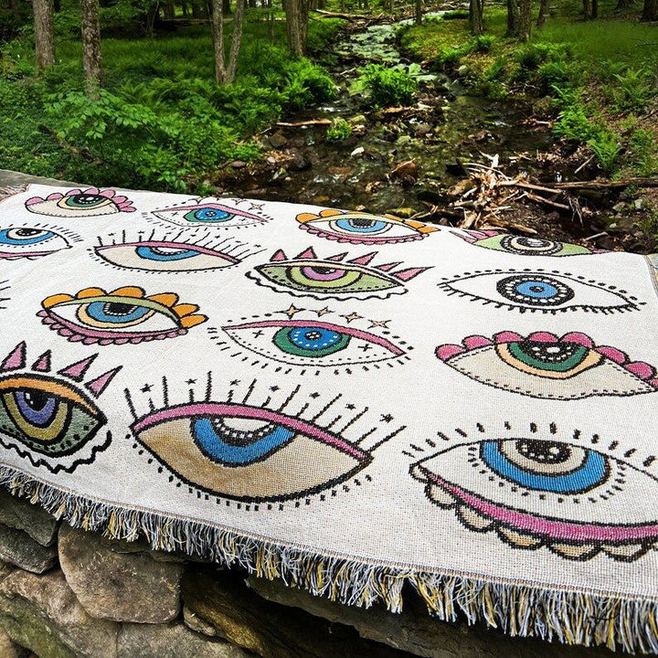 Couverture tissée à pompons style indien Olivenorma bleu et blanc avec œil mauvais