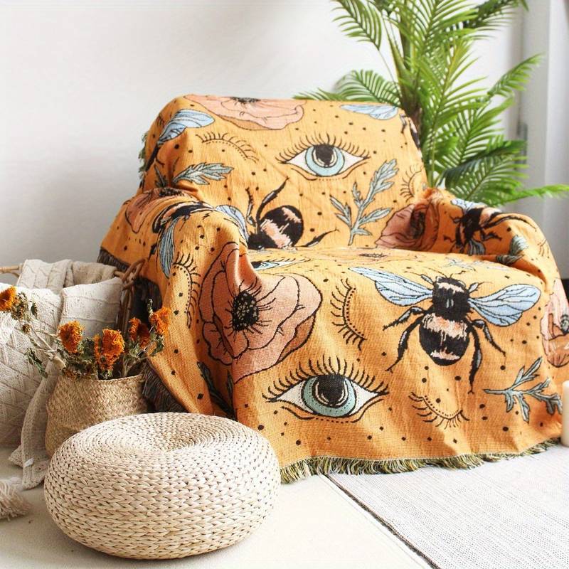 Couverture tissée à pompons avec fleurs de papillon orange Olivenorma