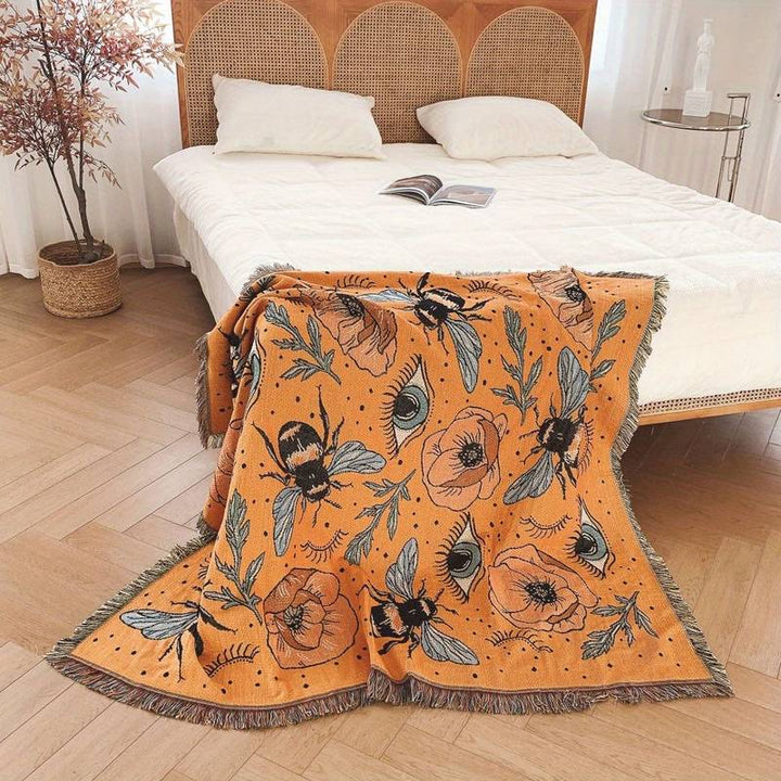 Couverture tissée à pompons avec fleurs de papillon orange Olivenorma