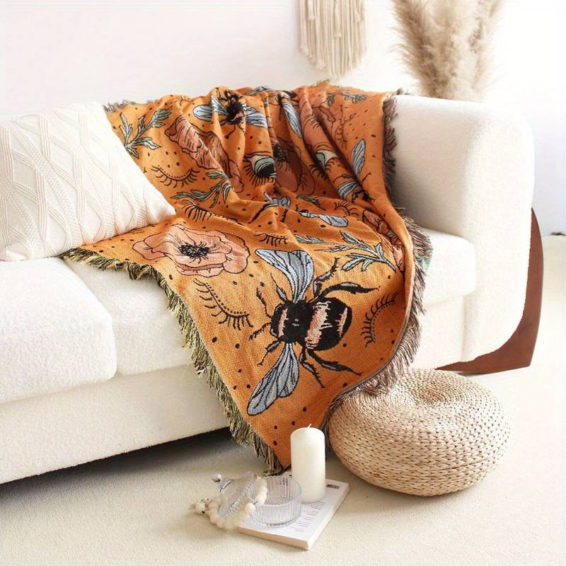 Couverture tissée à pompons avec fleurs de papillon orange Olivenorma