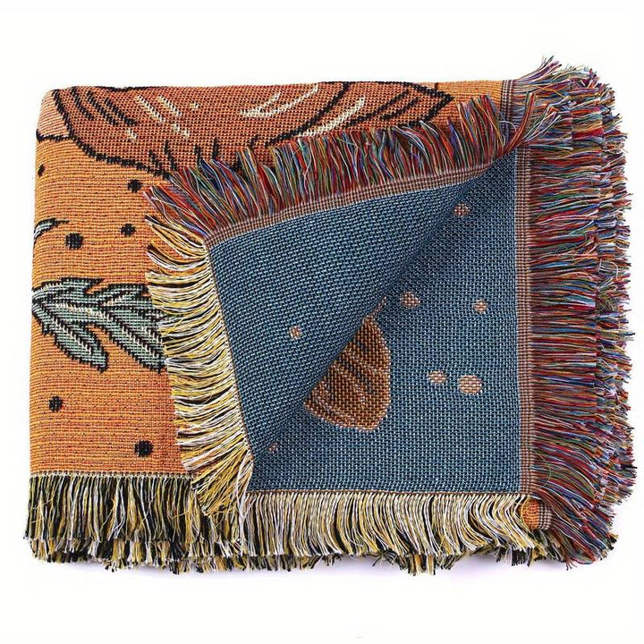 Couverture tissée à pompons avec fleurs de papillon orange Olivenorma
