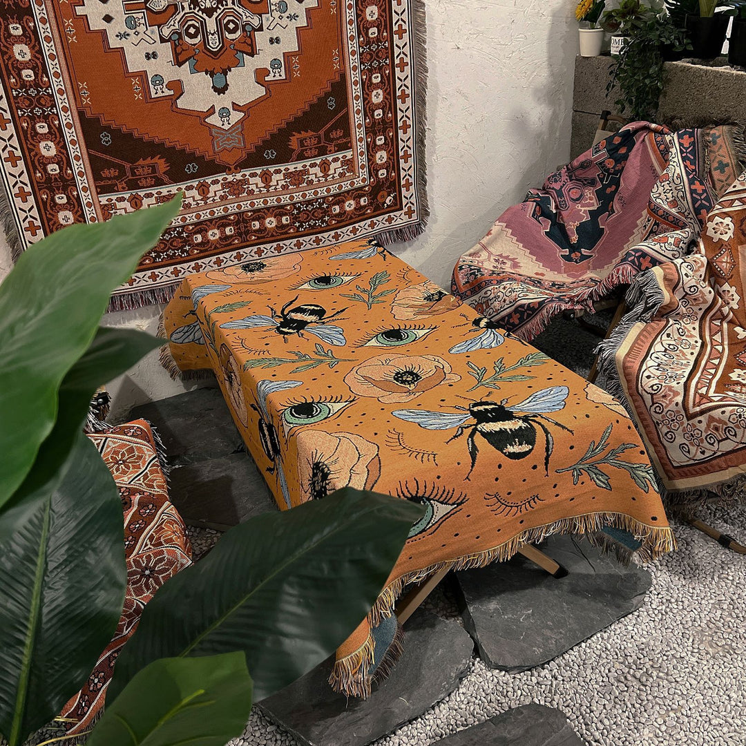 Couverture tissée à pompons avec fleurs de papillon orange Olivenorma