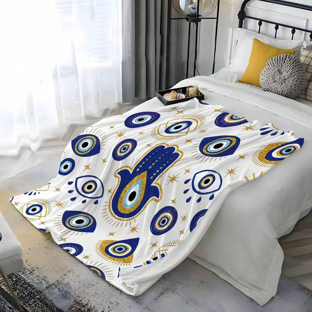 Couverture tissée en œil flanelle blanche et bleue avec motif mauvais et Hamsa Olivenorma