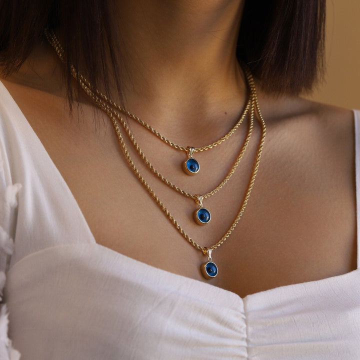 Collier avec pendentif en forme de mauvais œil bleu Olivenorma 