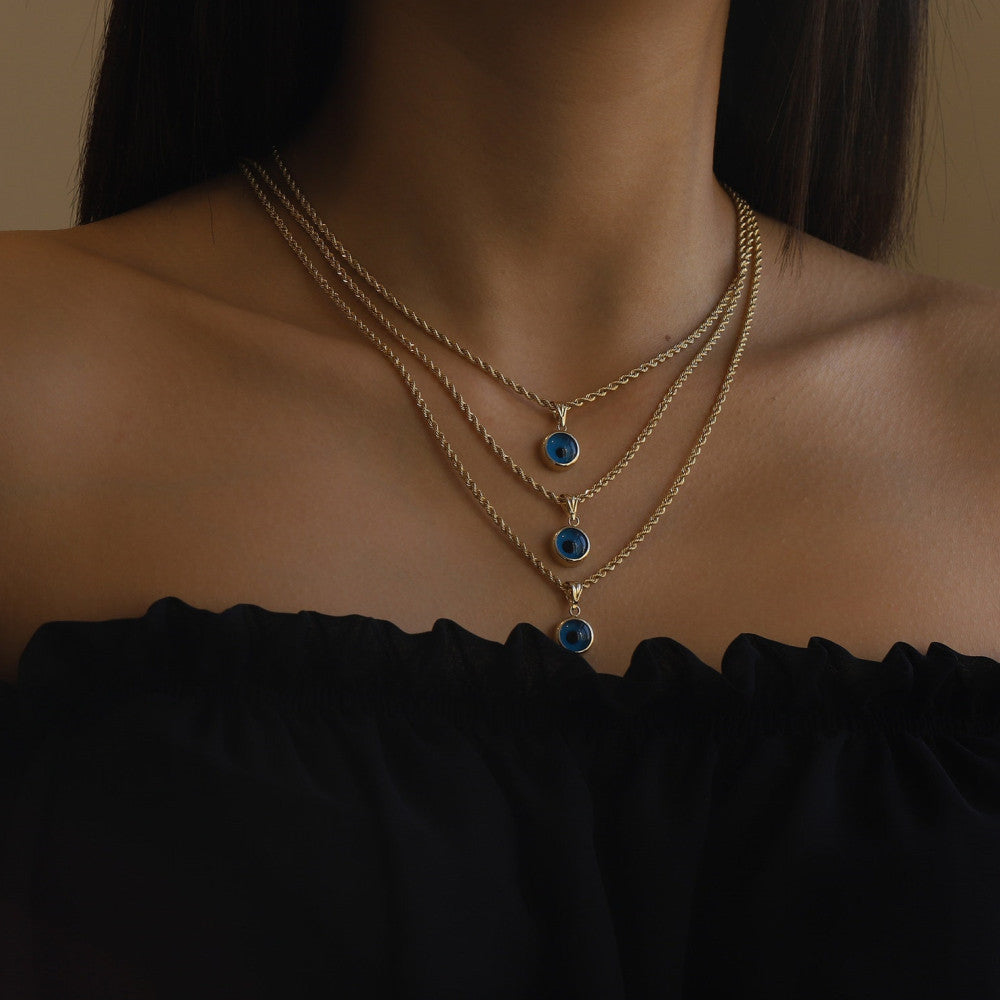 Collier avec pendentif en forme de mauvais œil bleu Olivenorma 