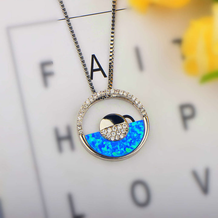 Collier pendentif rond en opale bleue hawaïenne Olivenorma