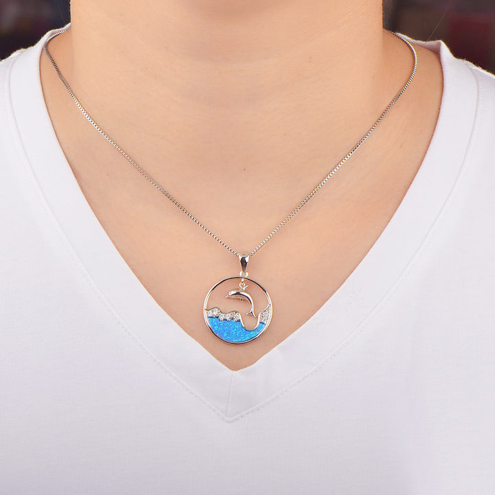 Collier pendentif dauphin océanique en zircon blanc et opale bleue Olivenorma